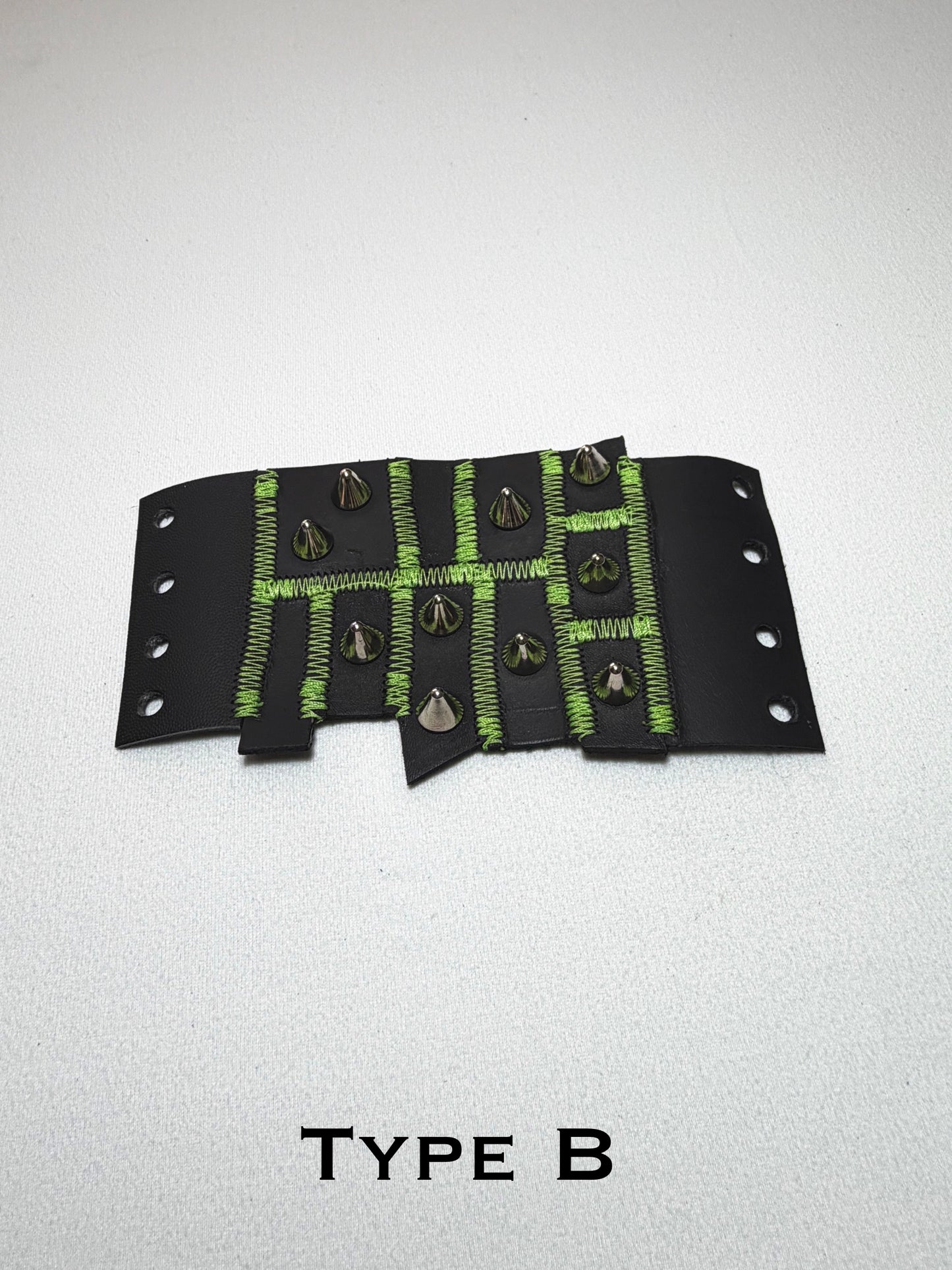Pieced together corset cuffs (green seam)