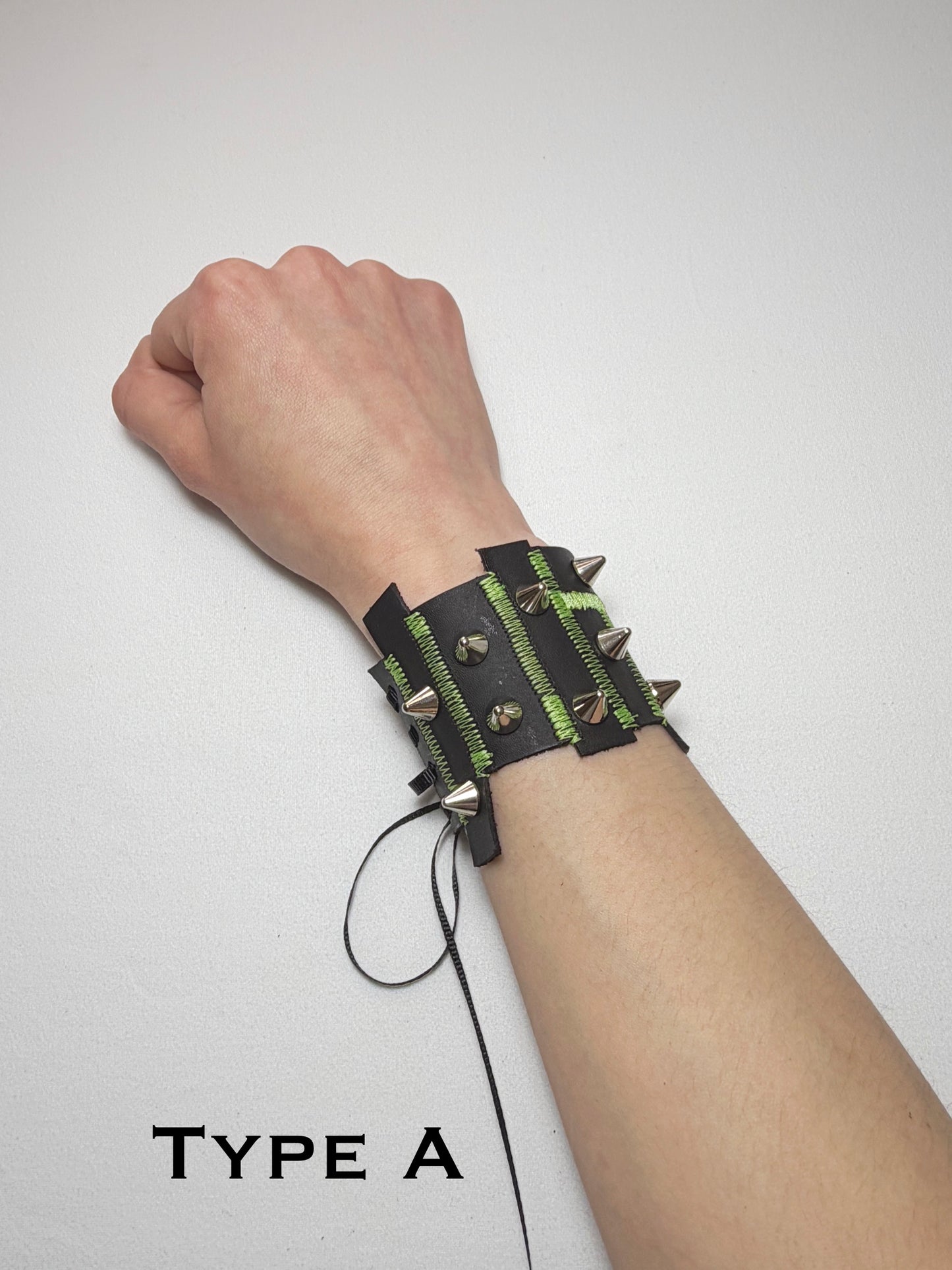 Pieced together corset cuffs (green seam)