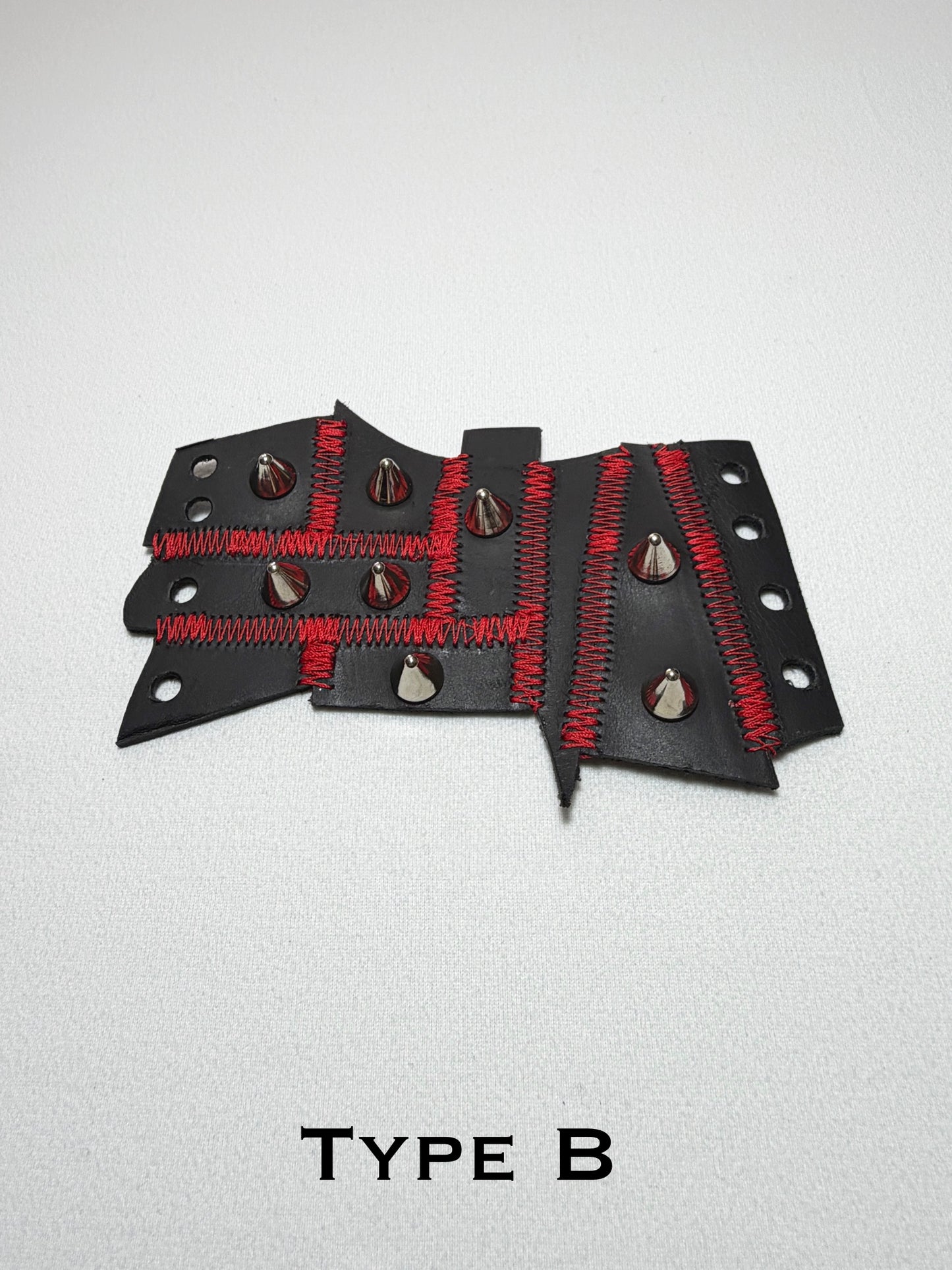 Pieced together corset cuffs (red seam)