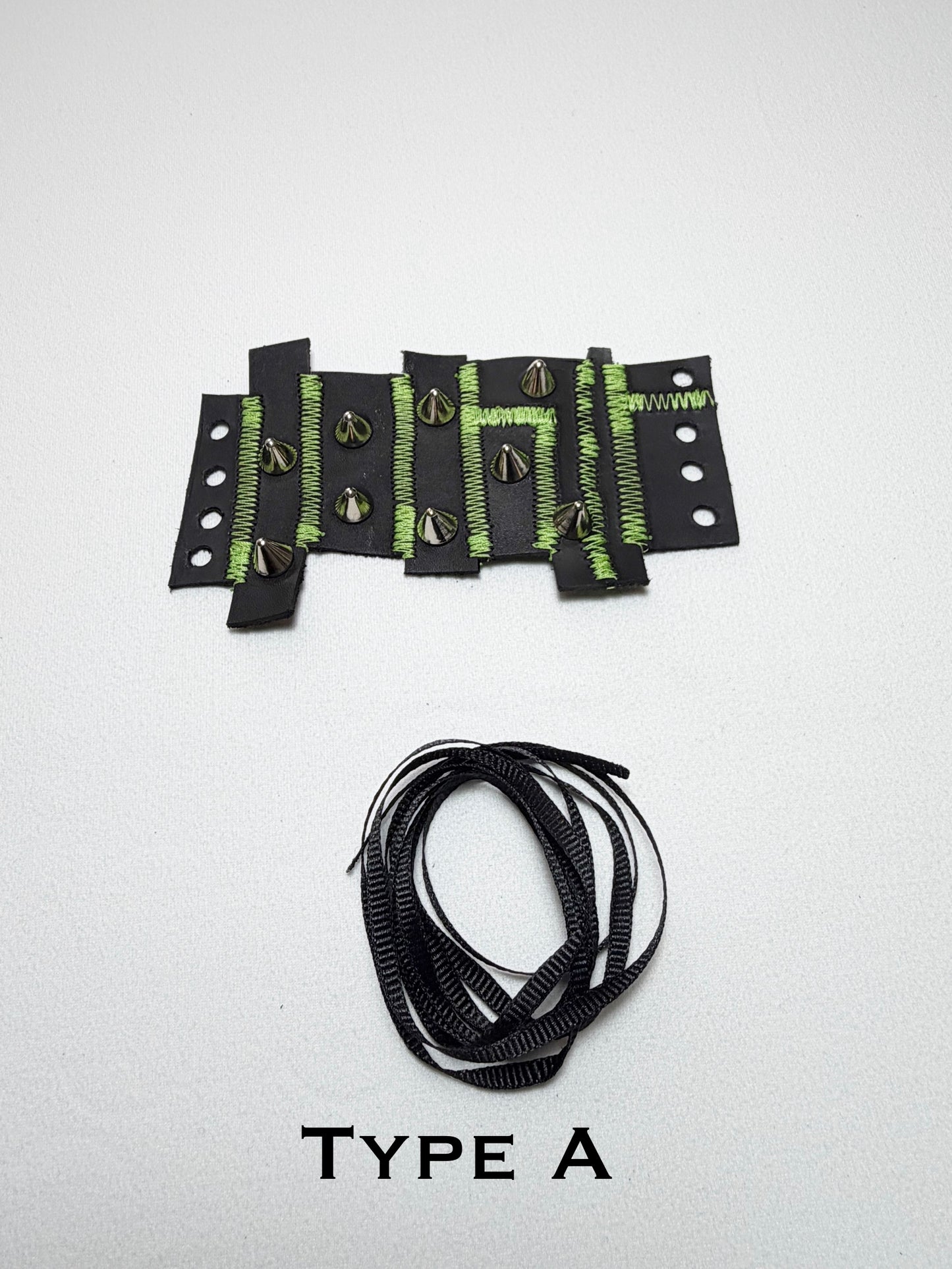 Pieced together corset cuffs (green seam)