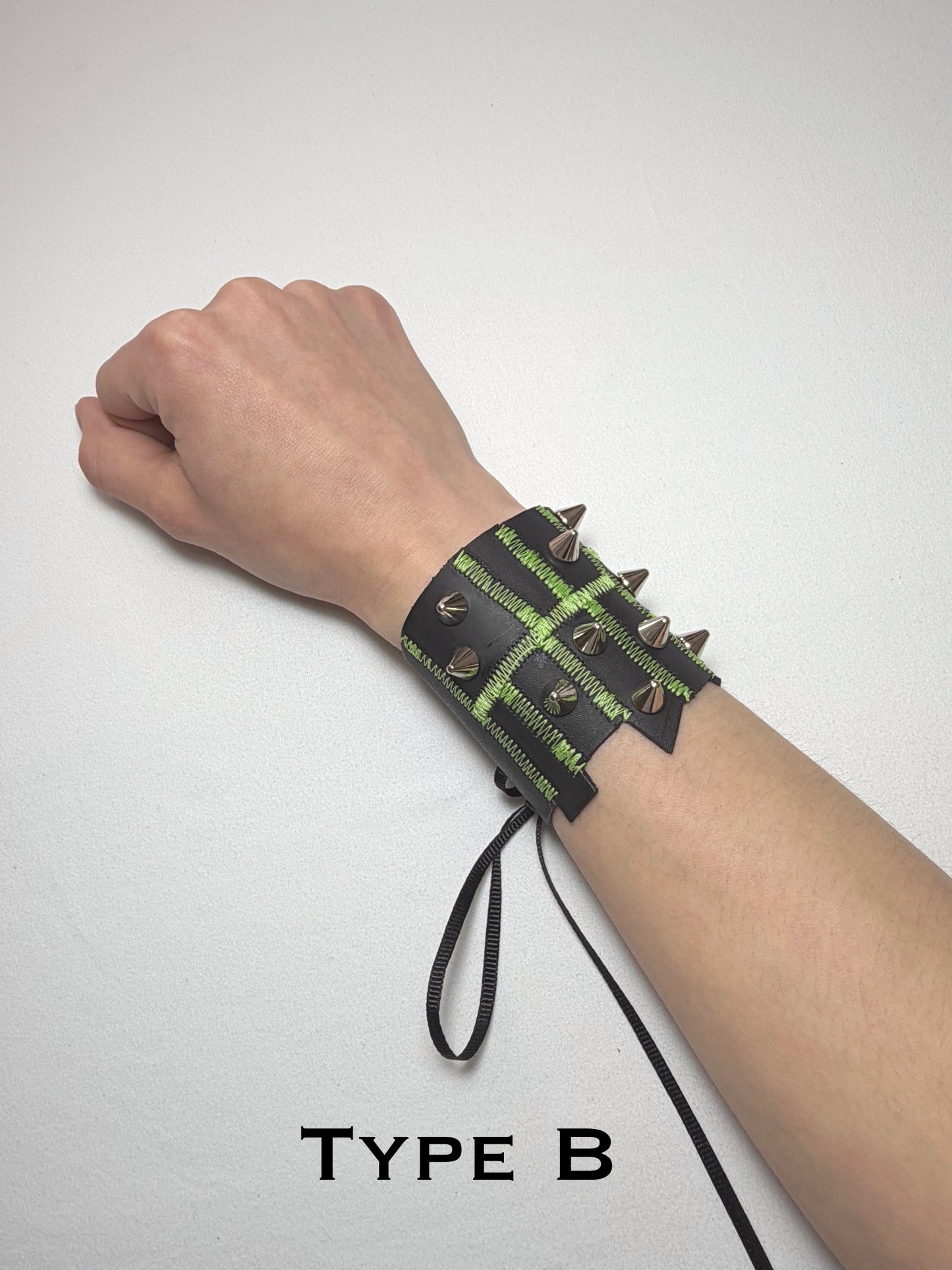Pieced together corset cuffs (green seam)