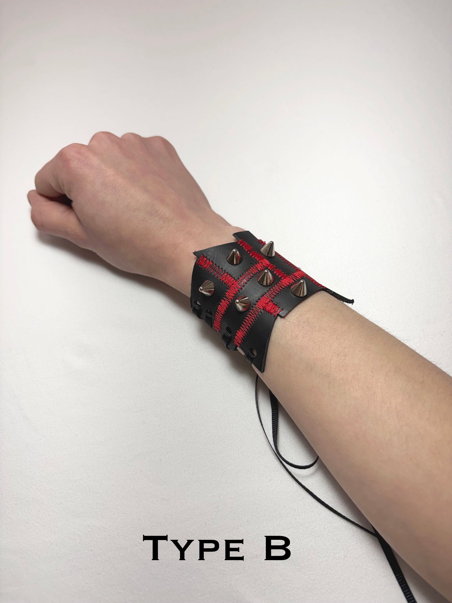 Pieced together corset cuffs (red seam)