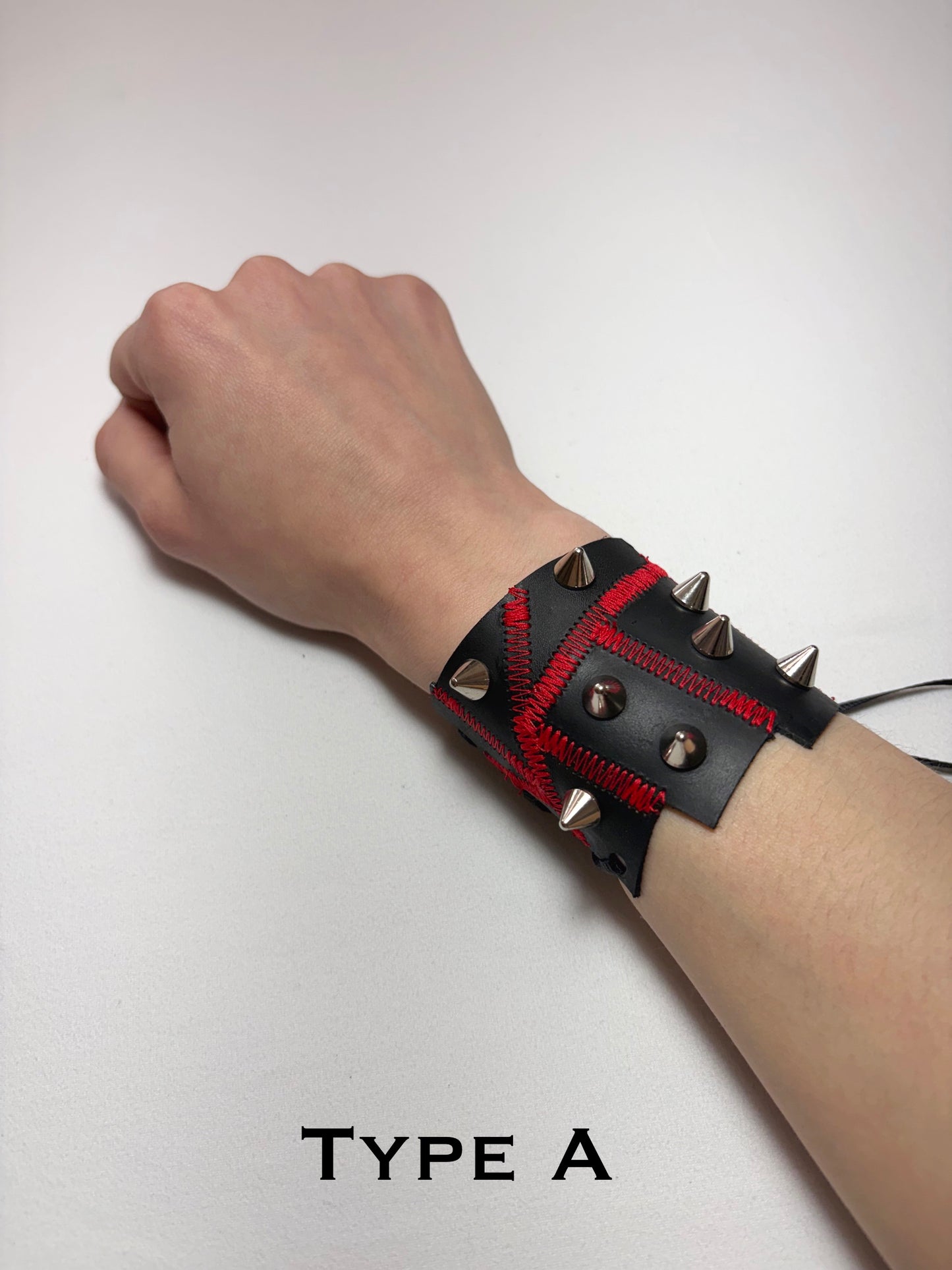 Pieced together corset cuffs (red seam)