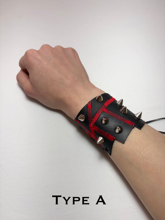 Pieced together corset cuffs (red seam)