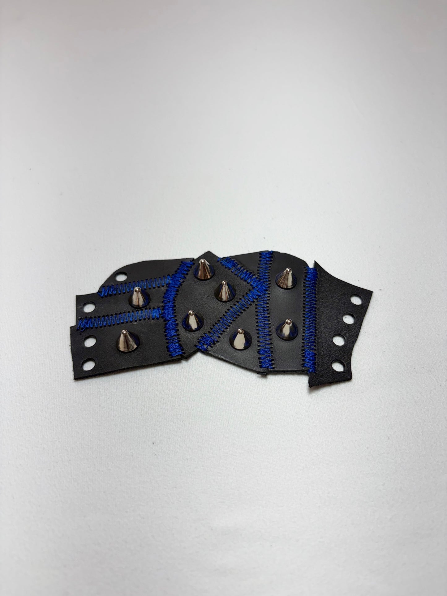 Pieced together corset cuffs (blue seam)