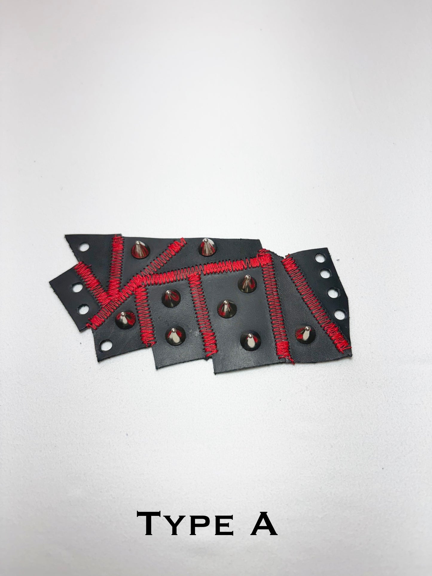 Pieced together corset cuffs (red seam)
